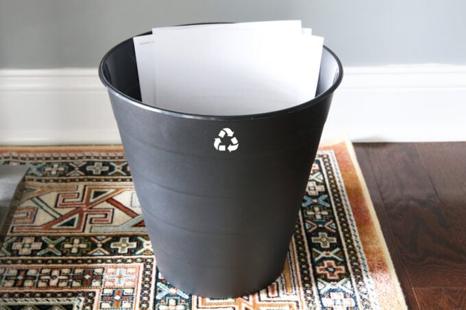 Recycling Bin with papers in it