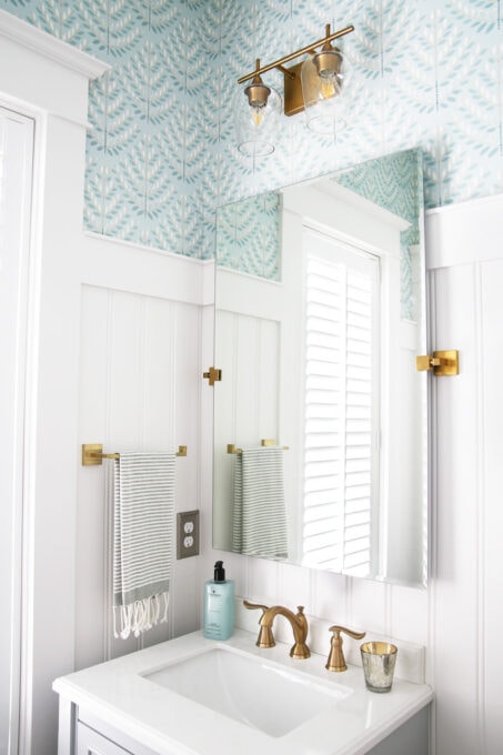 Powder Room Ideas: Gray Vanity to Replace Pedestal Sink,  Large Rectangular Mirror, and Brass Light Fixture