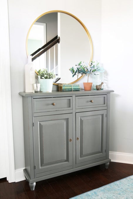 Small, Organized Entryway with Narrow Gray Entry Cabinet