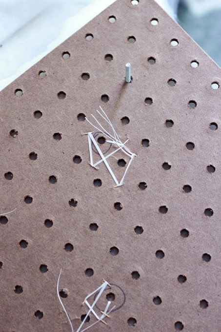 Bottom of pegboard showing how the tufts are attached