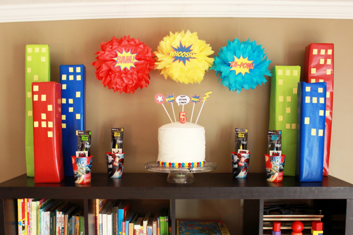 Cake, Buildings, and Pom-Poms for a Superhero Birthday Party