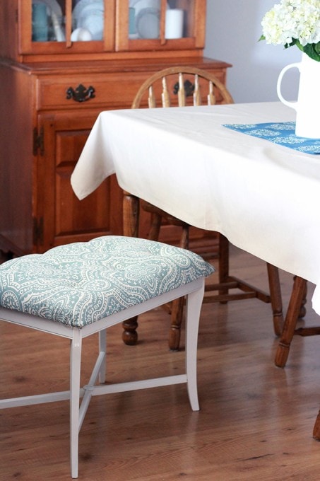 our finished tufted bench topped with aqua blue paisley fabric