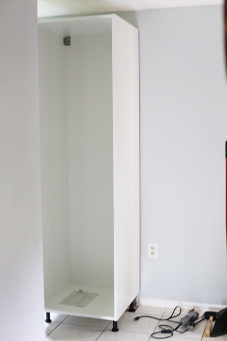 an empty floor to ceiling pantry cabinet