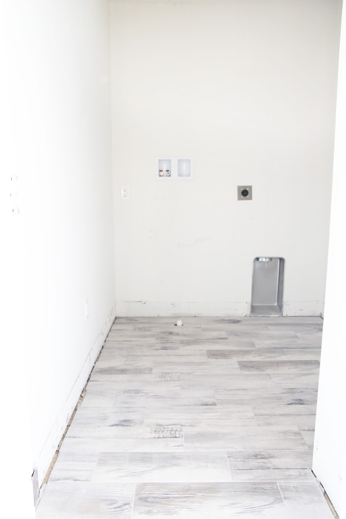 Final Tiled Floor in a Laundry Room