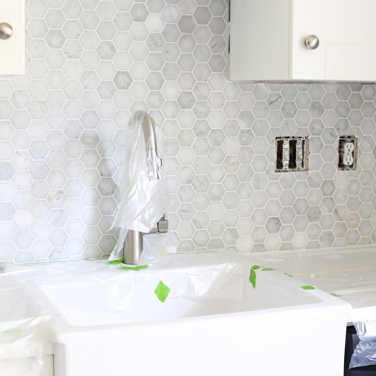 Installing Kitchen Tile with a Marble Hexagon Pattern