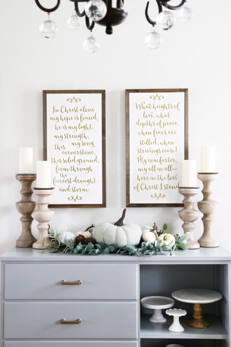 the DIY sideboard after painting with decorations on top