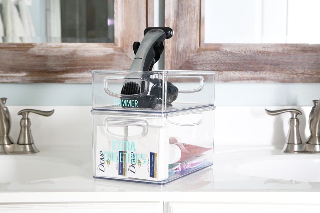 Clear bins for an organized cabinet under the bathroom sink