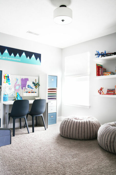 Playroom with desk, storage cubes, and beanbag chairs