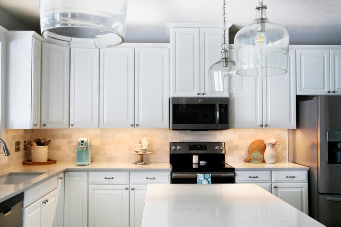 White kitchen with under cabinet lighting installed