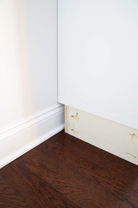 close up of the besta cabinet next to the existing baseboards