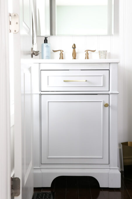 Gray Vanity in a Small Powder Room to Replace a Pedestal Sink