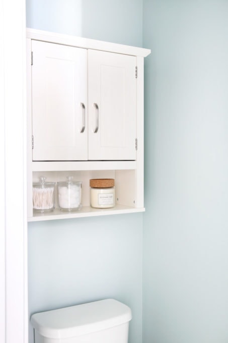 closeup of white bathroom cabinet