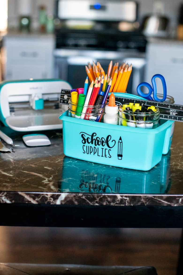 Aqua caddy with school supplies inside