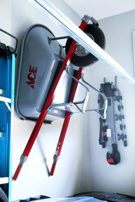 Wheelbarrow Hung on the Wall of a Garage with a Cleat