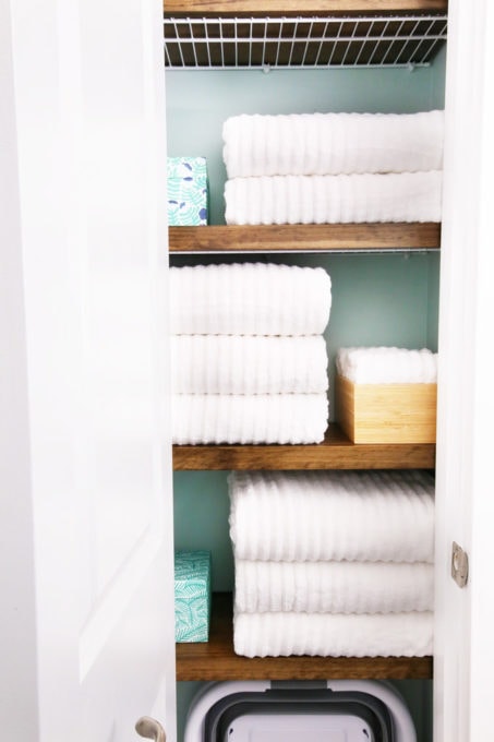 Folded Towels in Organized Linen Closet