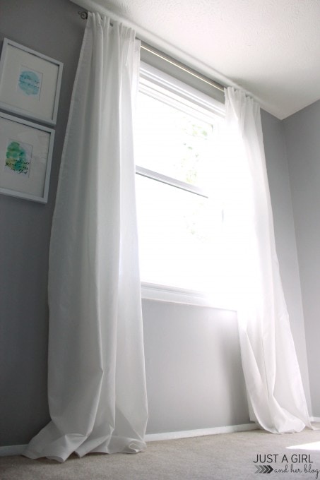 new white curtains hung over the office windows