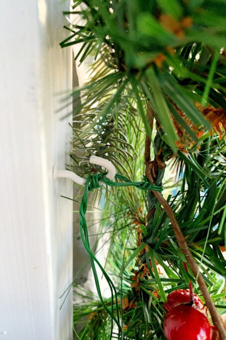 Floral Wire Wrapped Around Hook on Door Frame for Hanging Christmas Garland