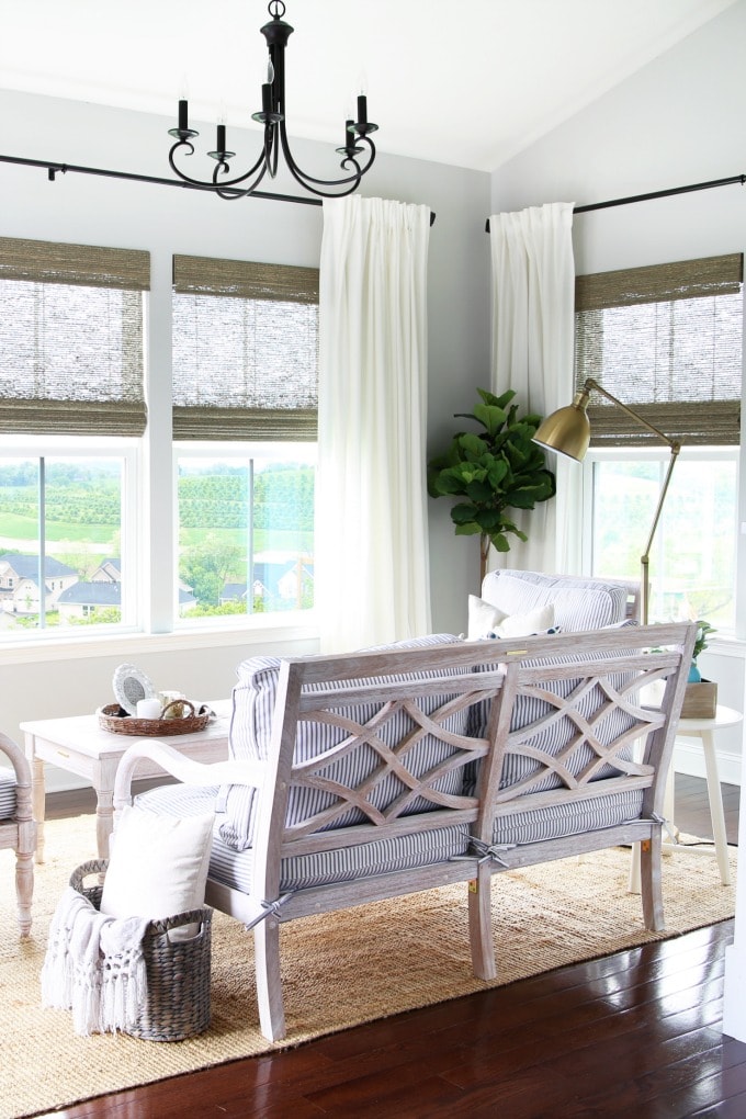 Wooden Love Seat in Summer Sunroom / Morning Room