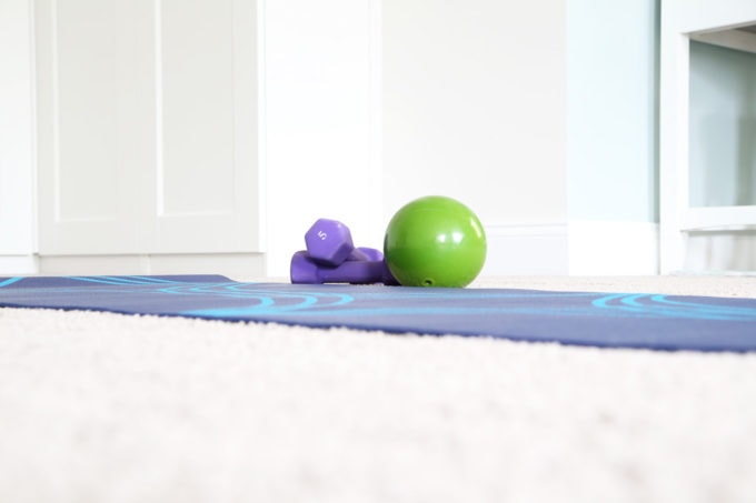 Yoga mat with medicine ball and 5 pound weights